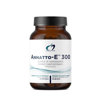 Supplement bottle with black cap and Annatto-E 300 label