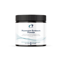 Magnesium glycinate powder supplement jar with black ribbed lid and white label