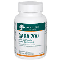 White supplement bottle with green label reading GABA 700, vegetarian capsules