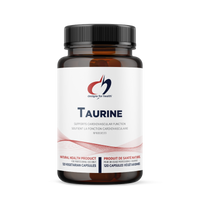 Taurine supplement bottle with black cap and amber capsules